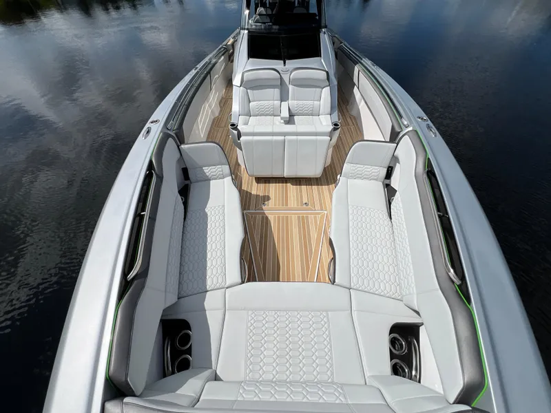 Slide: The Image of 2024 Nor-Tech 500 Sport boat interior with luxurious seating and sleek design. - 32