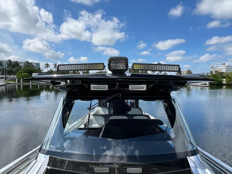 Slide: The Image of 2024 Nor-Tech 500 Sport boat on a sunny day, featuring sleek design and advanced lighting. - 33