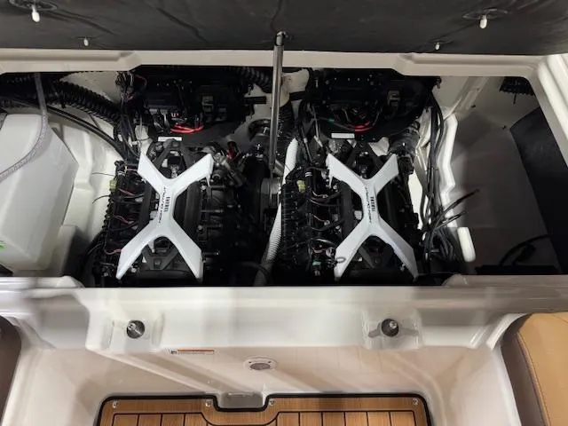 Slide: The Image of 2025 Yamaha Boats 252SE engine compartment showcasing dual engines and advanced mechanics. - 16