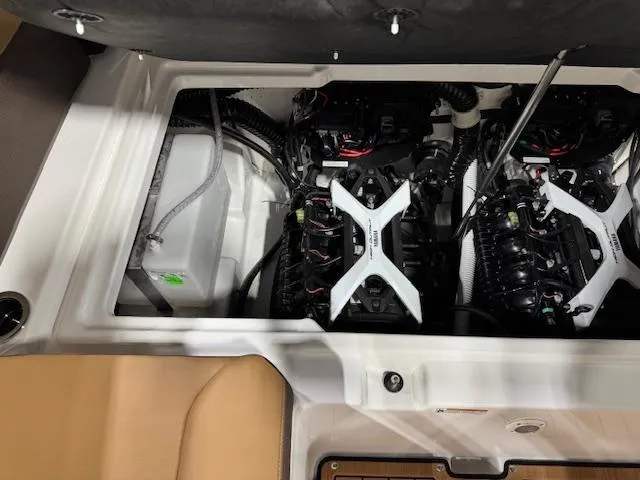 Slide: The Image of 2025 Yamaha Boats 252SE engine compartment showcasing dual engines and components. - 17
