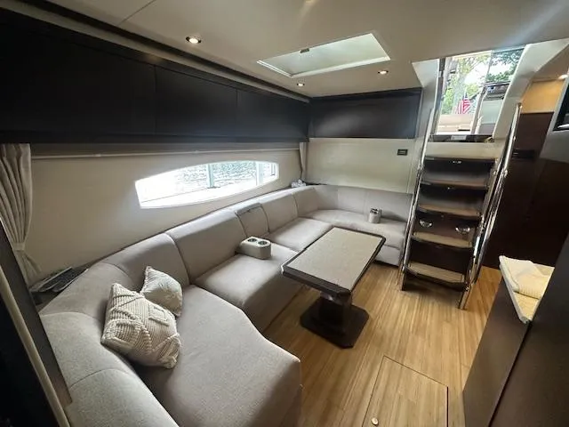 Slide: The Image of Luxurious interior of 2017 Regal 53 Sport Coupe yacht with elegant seating and modern design. - 18