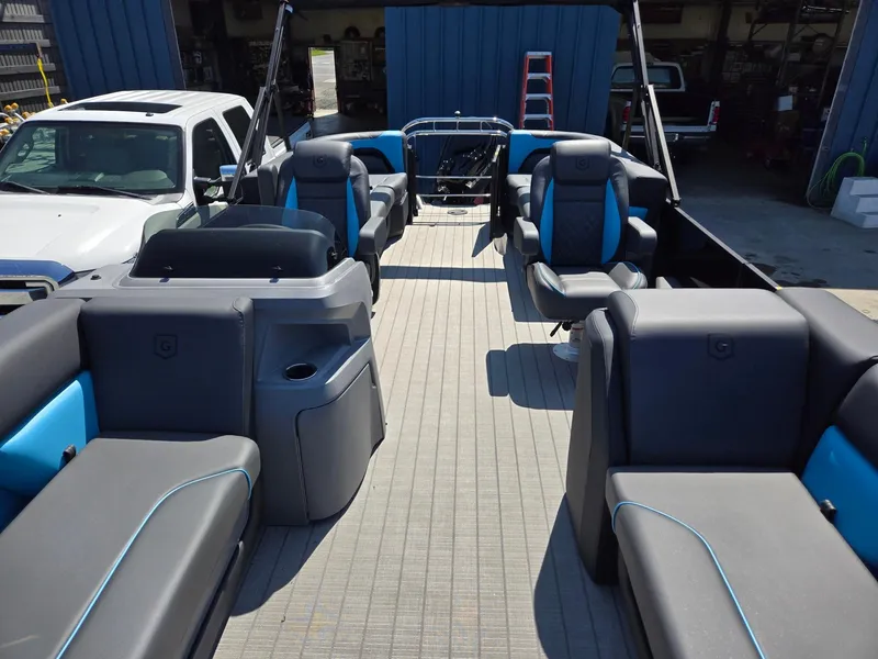 Slide: The Image of 2025 Godfrey Sweetwater 2486 SB pontoon boat with spacious seating and modern design. - 10