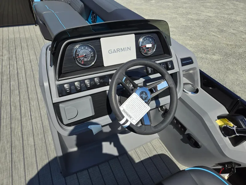 Slide: The Image of Dashboard of 2025 Godfrey Sweetwater 2486 SB boat with Garmin navigation system. - 16