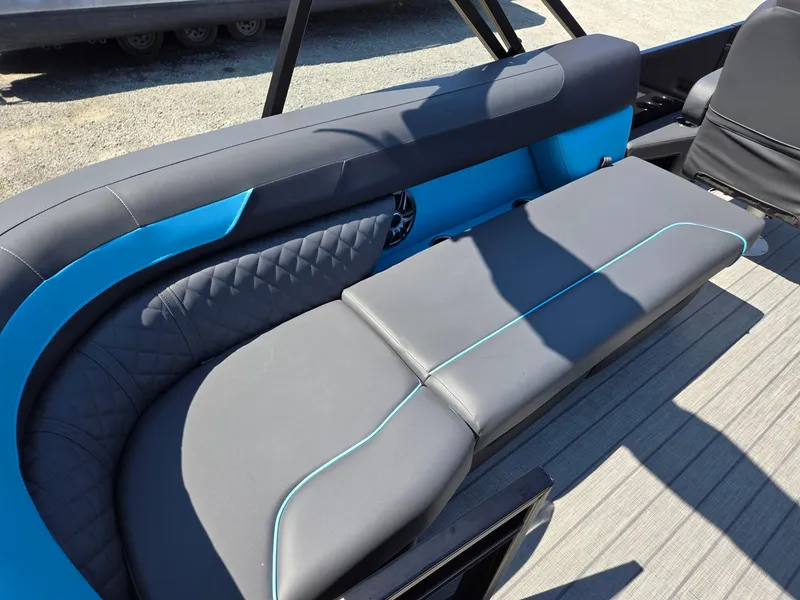 Slide: The Image of 2025 Godfrey Sweetwater 2486 SB boat interior with stylish seating and modern design. - 29