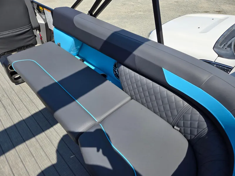 Slide: The Image of 2025 Godfrey Sweetwater 2486 SB boat interior with stylish gray and blue seating. - 30
