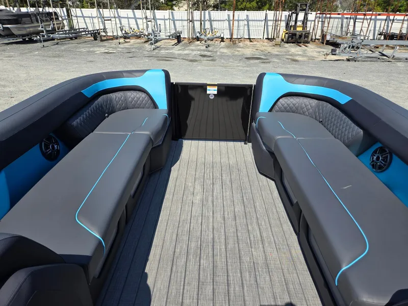 Slide: The Image of 2025 Godfrey Sweetwater 2486 SB pontoon boat interior with sleek seating and modern design. - 34