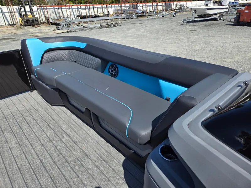 Slide: The Image of 2025 Godfrey Sweetwater 2486 SB boat interior with sleek seating and modern design. - 36