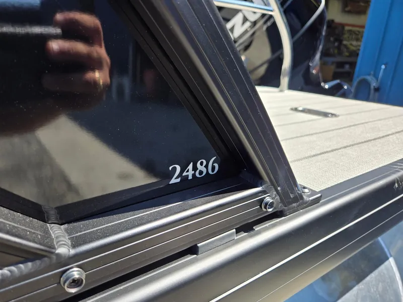 Slide: The Image of Close-up of 2025 Godfrey Sweetwater 2486 SB boat detail. - 40