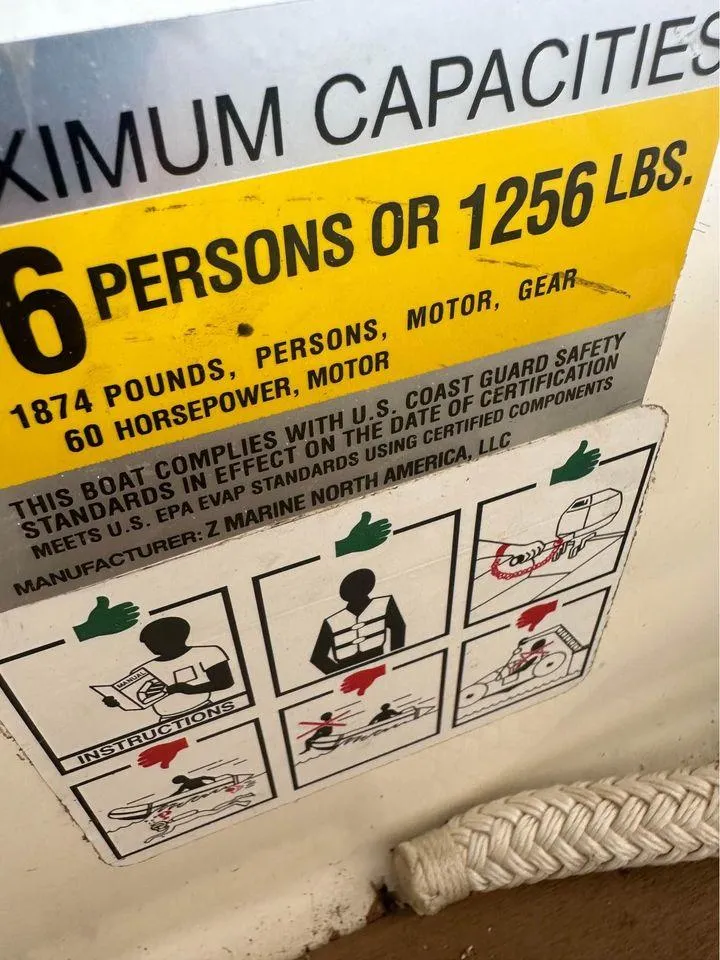 Slide: The Image of Zodiac 440DL 2021 boat capacity label, 6 persons or 1256 lbs, 60 horsepower motor. - 10