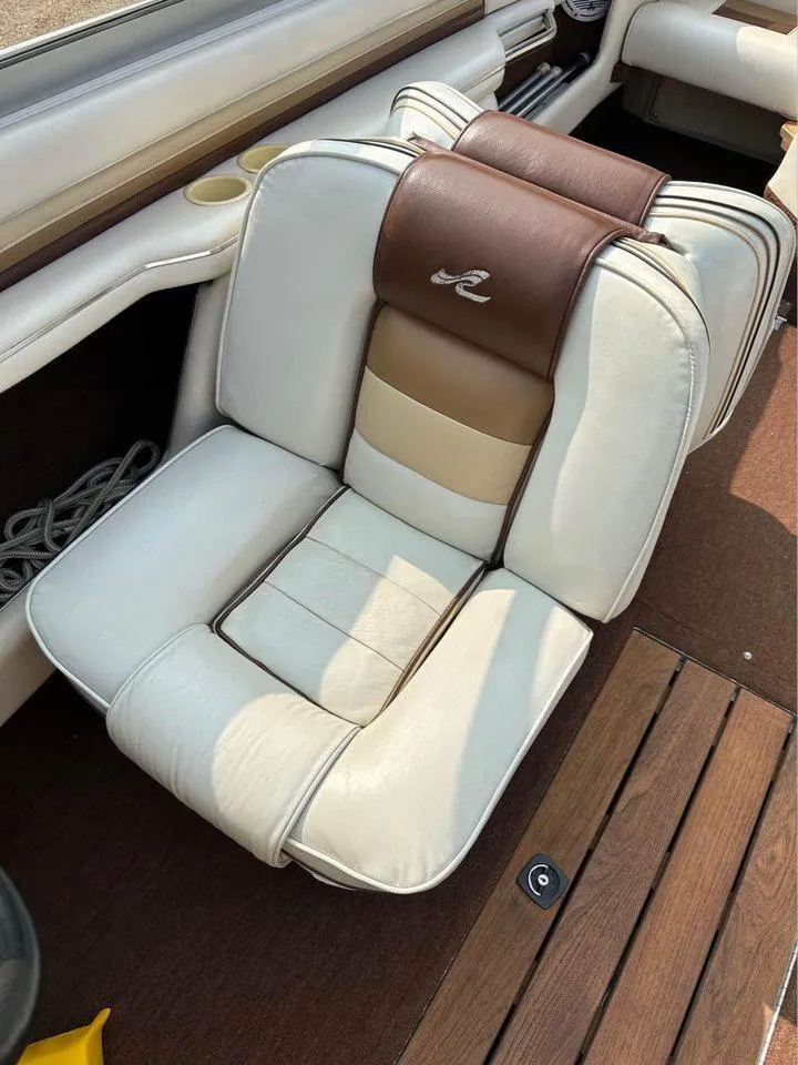 Slide: The Image of 1987 Sea Ray Sorrento 21 boat seat with brown and cream upholstery. - 5