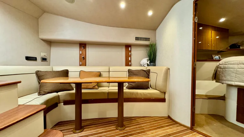 Slide: The Image of Interior of 2012 Viking 42 Open yacht with elegant seating area. - 22