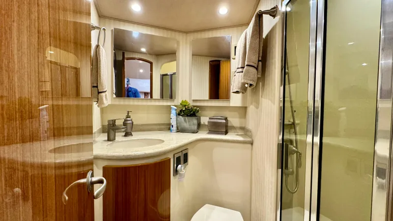 Slide: The Image of Luxurious bathroom on the 2012 Viking 42 Open yacht. - 24