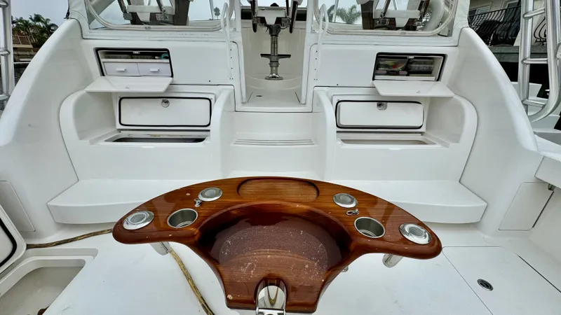 Slide: The Image of Interior of a 2012 Viking 42 Open yacht with wooden table. - 35