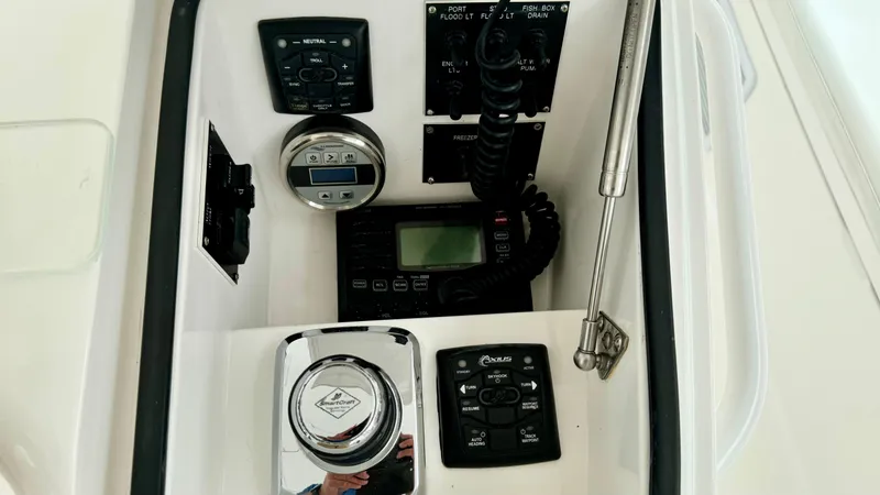 Slide: The Image of Control console of a 2012 Viking 42 Open boat. - 36