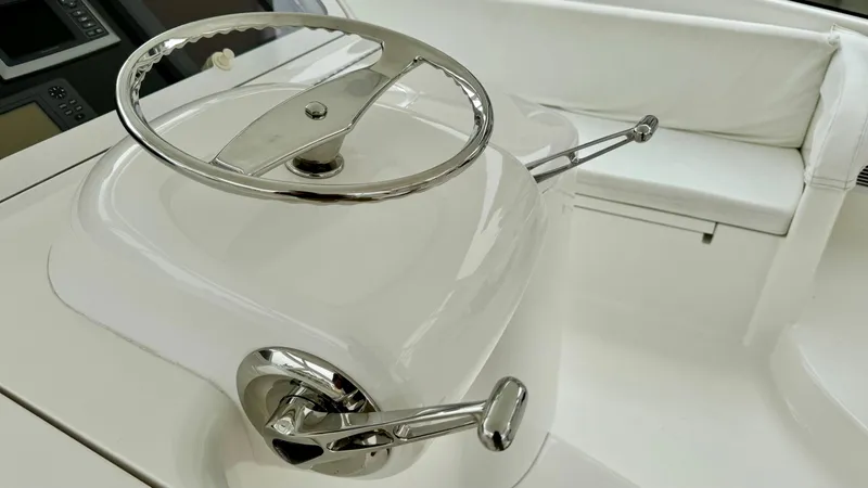 Slide: The Image of Helm station of a 2012 Viking 42 Open boat. - 37