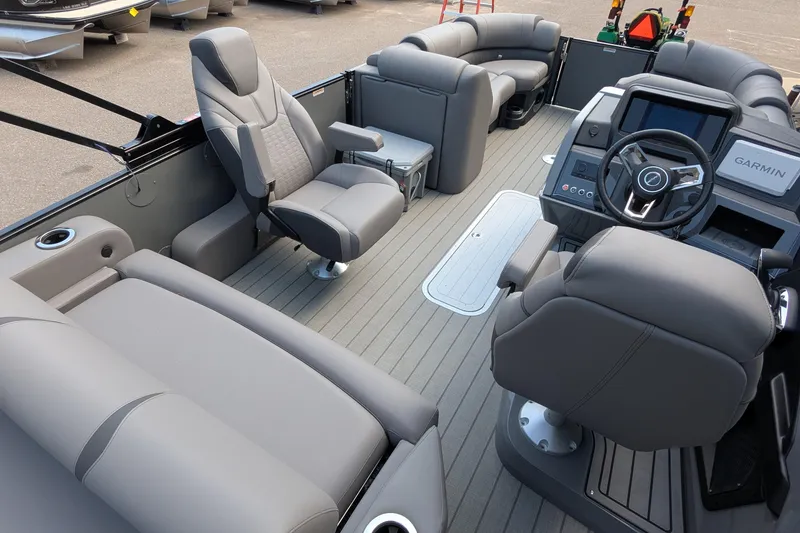 Slide: The Image of 2025 Avalon Catalina Versatile Rear Lounger interior with luxurious seating and modern dashboard. - 13