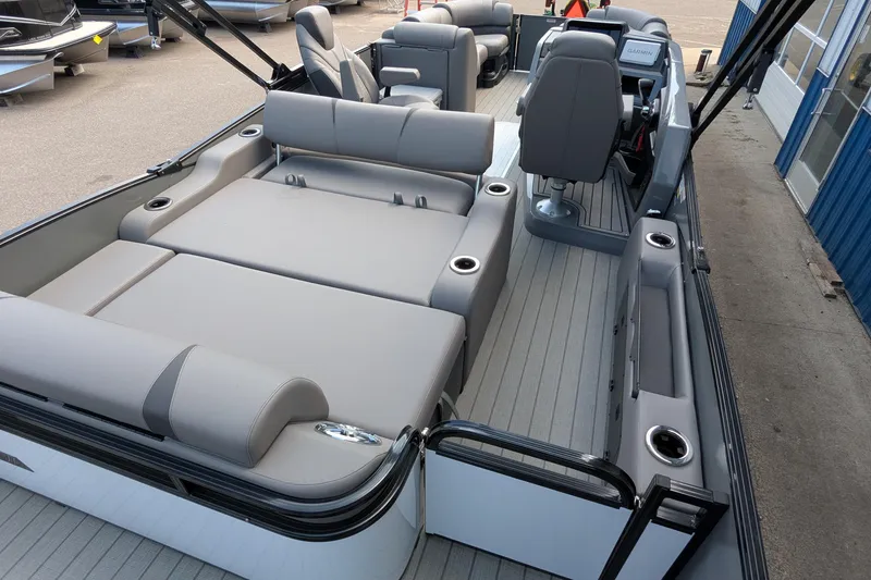 Slide: The Image of 2025 Avalon Catalina Versatile Rear Lounger boat with spacious seating and modern design. - 14