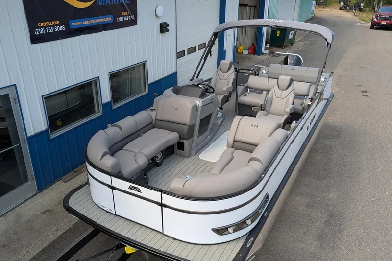 Slide: The Image of 2025 Avalon Catalina Versatile Rear Lounger pontoon boat with luxurious seating and modern design. - 6
