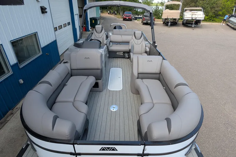 Slide: The Image of 2025 Avalon Catalina Versatile Rear Lounger pontoon boat with spacious seating and modern design. - 7