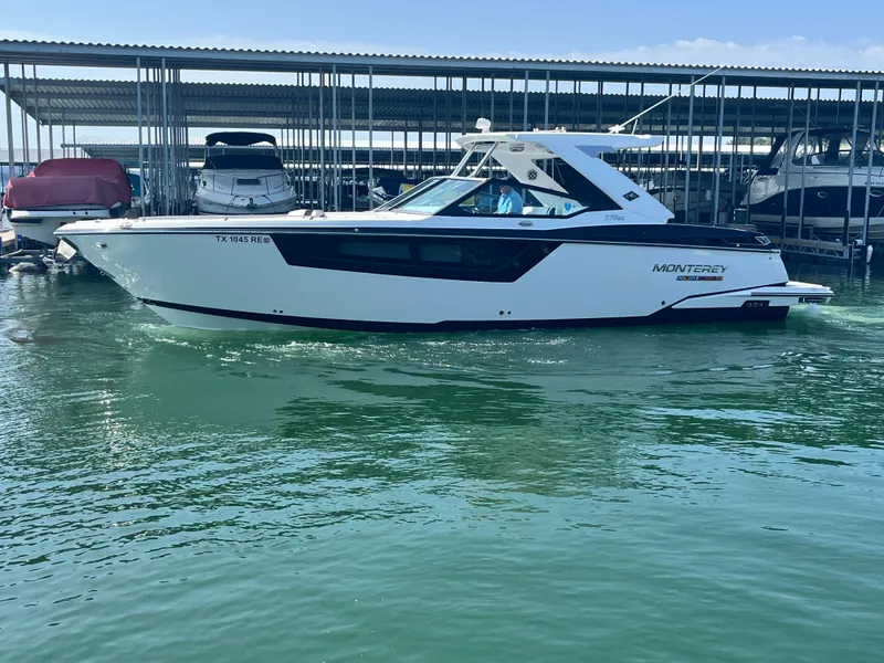The Image of 2018 Monterey 378 SE boat docked in marina, side view. - 0