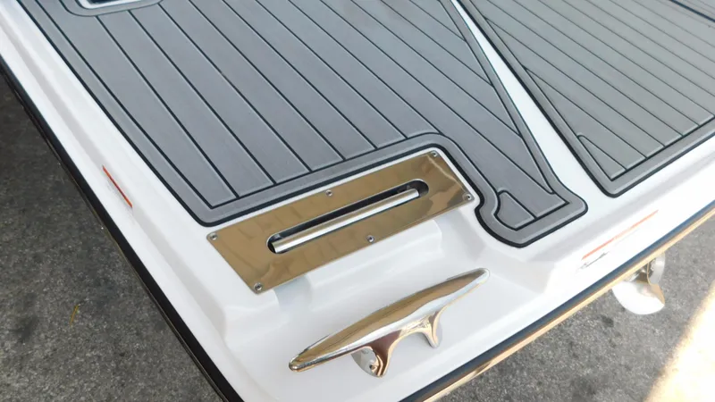 Slide: The Image of 2018 Monterey 378 SE boat deck with sleek design and metallic accents. - 27