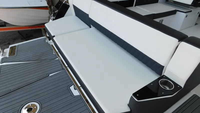 Slide: The Image of 2018 Monterey 378 SE boat seating area with sleek design and cup holders. - 44