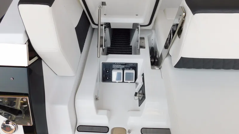 Slide: The Image of Interior view of a 2018 Monterey 378 SE boat, featuring seating and control panel. - 45