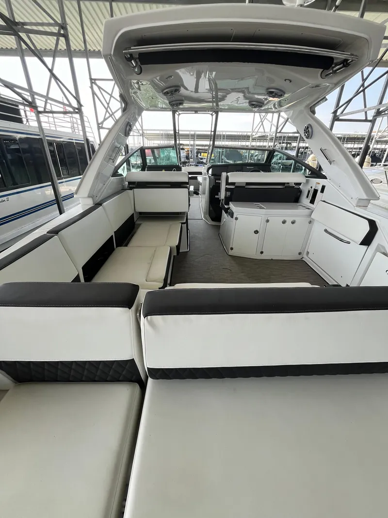 Slide: The Image of 2018 Monterey 378 SE boat interior with spacious seating and modern design. - 31