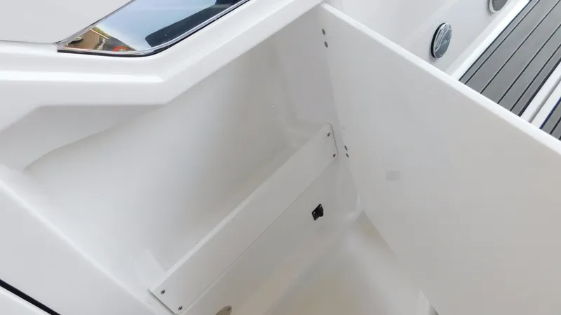 Slide: The Image of 2018 Monterey 378 SE boat interior detail with white compartment and sleek design. - 42
