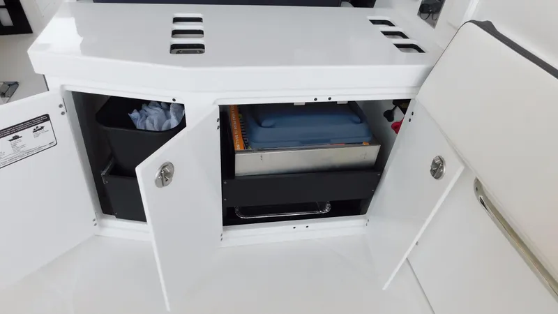 Slide: The Image of Open storage compartment in 2018 Monterey 378 SE boat interior. - 48