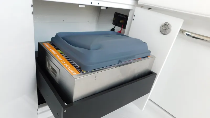 Slide: The Image of Built-in grill drawer on 2018 Monterey 378 SE boat. - 49