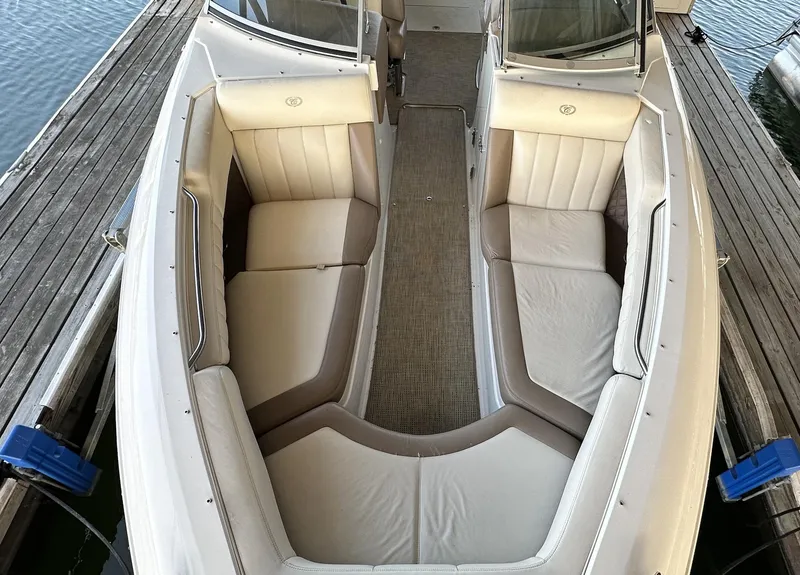 Slide: The Image of 2010 Cobalt 276 boat with spacious seating and elegant interior design. - 10