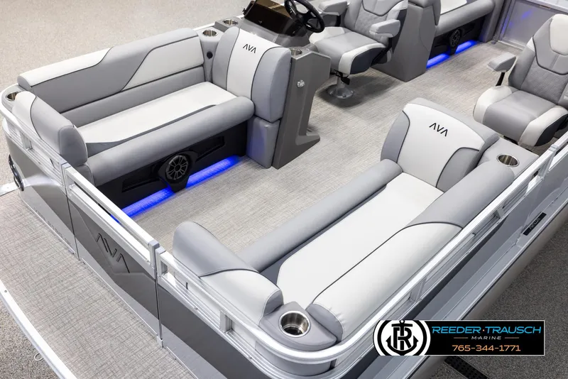 Slide: The Image of 2025 Avalon VEN QL pontoon boat interior with gray seating and blue LED lighting. - 10