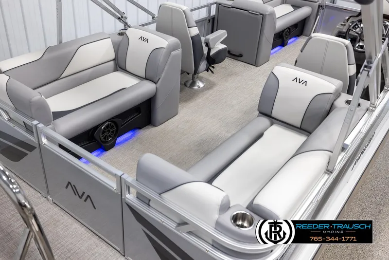 Slide: The Image of Luxurious 2025 Avalon VEN QL boat interior with gray seating and blue LED lighting. - 12