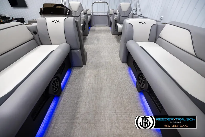 Slide: The Image of Luxurious 2025 Avalon VEN QL boat interior with LED lighting and plush seating. - 13