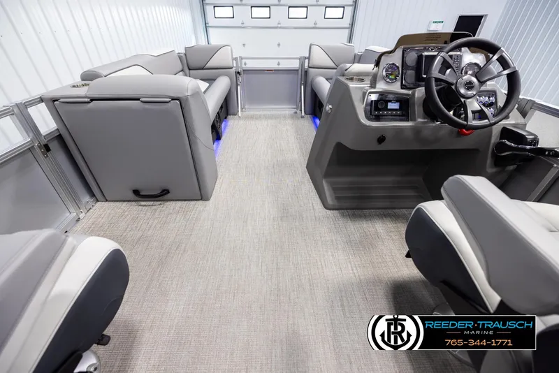 Slide: The Image of Interior of 2025 Avalon VEN QL boat with modern seating and steering console. - 17