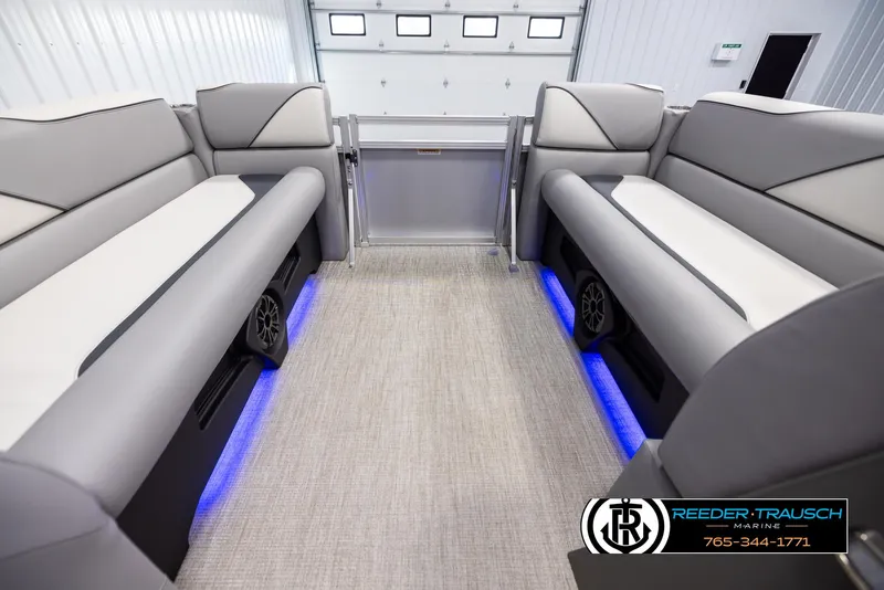 Slide: The Image of 2025 Avalon VEN QL interior with gray seating and blue LED lighting. - 18