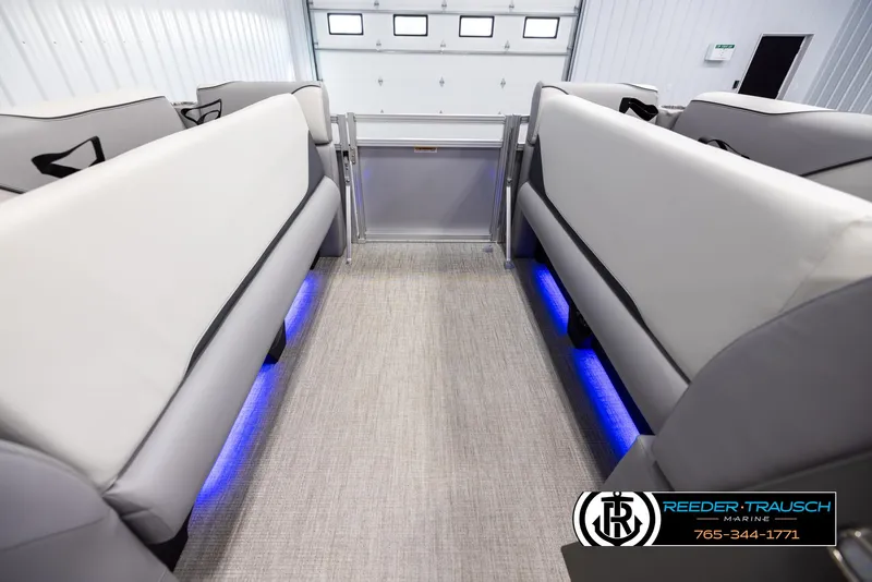 Slide: The Image of 2025 Avalon VEN QL interior with gray seating and blue LED lighting. - 19