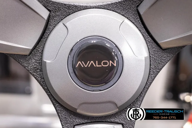 Slide: The Image of Close-up of 2025 Avalon VEN QL steering wheel with logo. - 26