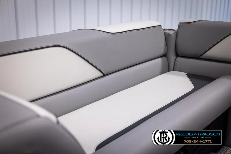 Slide: The Image of Avalon VEN QL 2025 boat interior with sleek gray and white seating design. - 33