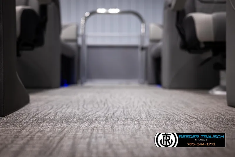 Slide: The Image of Interior of 2025 Avalon VEN QL, featuring modern seating and carpeted flooring. - 37
