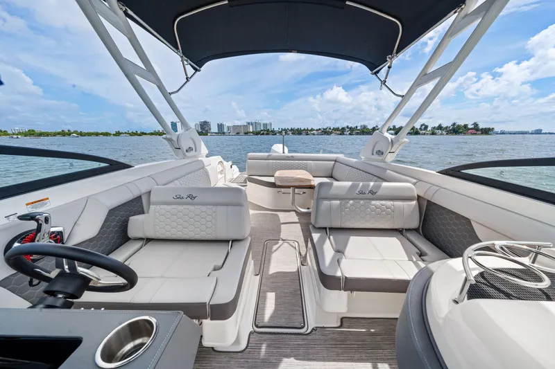 Slide: The Image of 2023 Sea Ray SDX 270 Outboard boat interior with spacious seating and sleek design. - 20