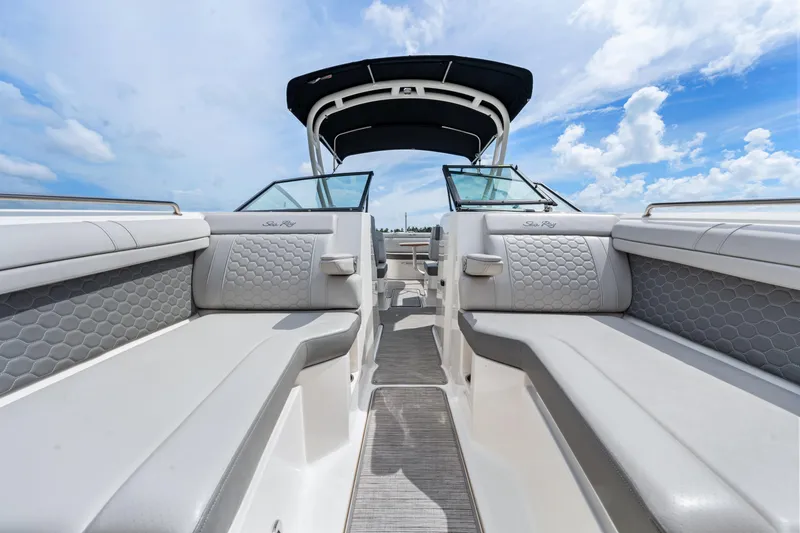 Slide: The Image of 2023 Sea Ray SDX 270 Outboard interior with luxurious seating and open deck design. - 30
