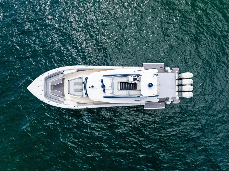 Slide: The Image of Aerial view of 2022 Scout LXF boat on open water. - 10
