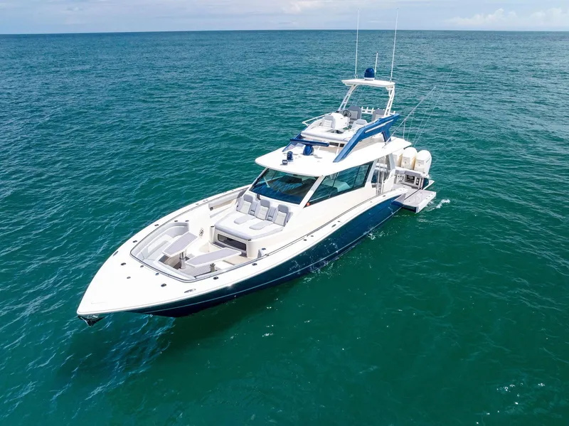 Slide: The Image of 2022 Scout LXF boat cruising on open ocean waters. - 15