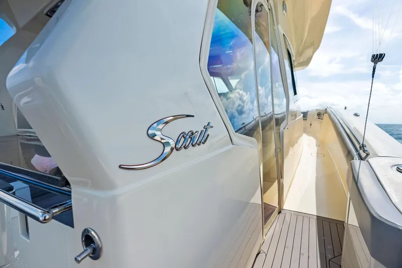 Slide: The Image of 2022 Scout LXF yacht, sleek design, ocean view, luxury boating experience. - 36
