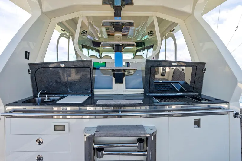 Slide: The Image of 2022 Scout LXF yacht kitchen with modern appliances and sleek design. - 43