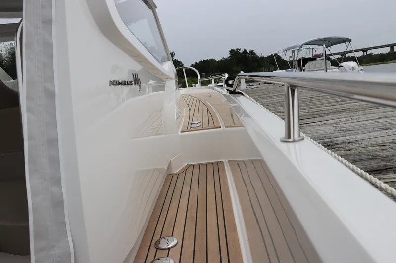 Slide: The Image of 2024 Nimbus Weekender 9 boat with sleek deck design and modern features. - 19
