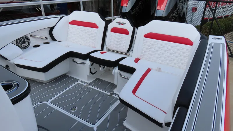 Slide: The Image of 2025 Sunsation 32 CCX boat interior with white and red seating, modern design. - 10