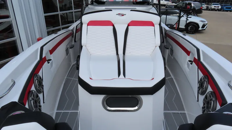 Slide: The Image of 2025 Sunsation 32 CCX boat interior with white and red seating, modern design. - 17